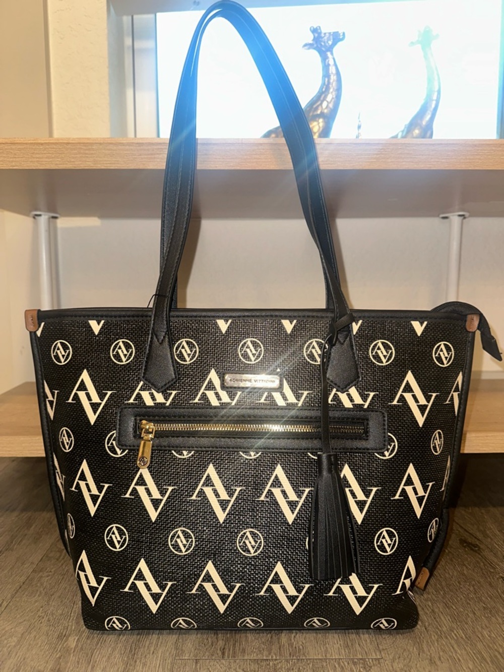 Adrienne Vittadini Black and Cream Logo Tote with Tassel